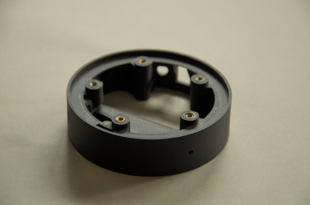 Print and inserts — photograph of the Lumi hardware.